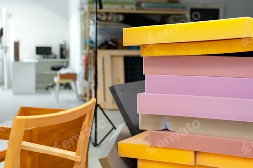 Preview: Stacked sheets of foam rubber for furniture production in factory workshop