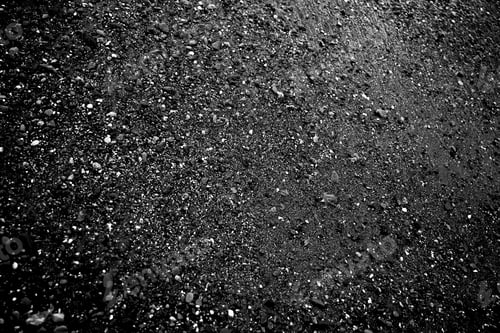 Preview: Pebble beach black and white. Shiny bright dark background. Luxury black texture.