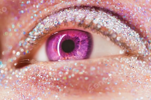 Preview: Macro violet or pink female eye with glitter eyeshadow, colorful sparks, crystals. Beauty background