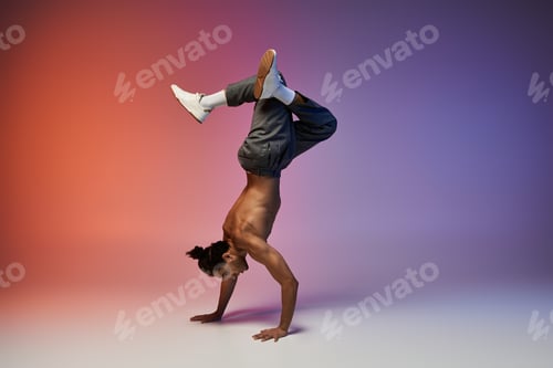 Preview: African american dancer performs handstand