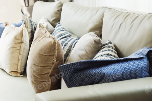 Preview: Close up of cushion on sofa background