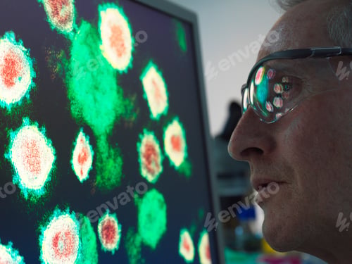 Preview: Scientist examining cells under a microscope with reflection in glasses
