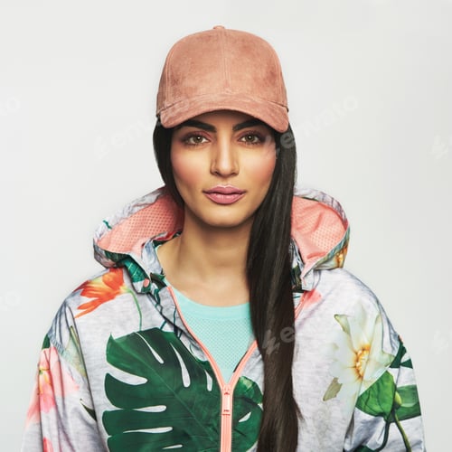 Preview: Beautiful woman in jacket and cap