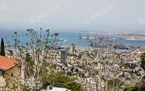 Preview: Seaport in the city of Haifa, panorama of the port and city buildings against the background
