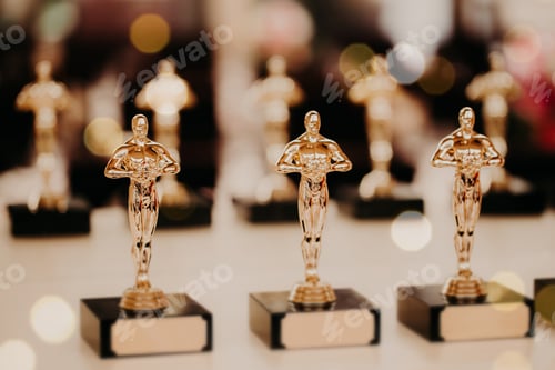 Preview: Oscar award. Prize for victory. Golden trophy,. Success concept. Horizontal shot
