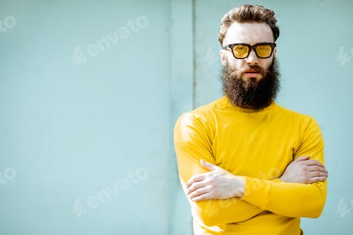 Preview: Portrait of a stylish man on the colorful background