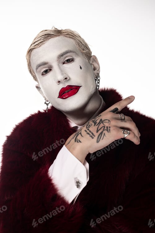 Preview: Young man showcases artistic Joker costume for Halloween celebration