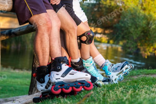 Preview: Four cacuasian people on inline skates in a park