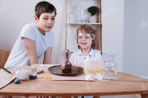 Preview: two brothers experimenting in the home laboratory and studying the chemical properties
