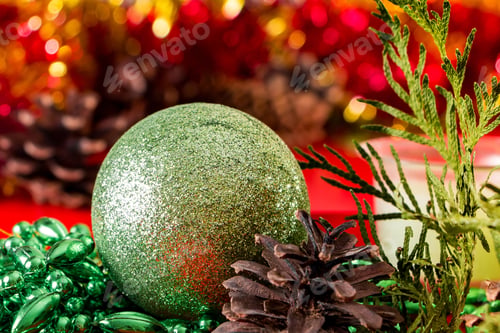 Preview: Christmas decor with pine cone and cristmas balls on red background