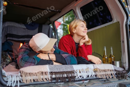 Preview: Young Adventurers Relax in a Forest Camper Amidst Nature