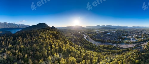 Preview: Sunny Sunset over Canadian Mountains. Aerial Nature Background