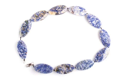 Preview: colored onyx beads isolated on white background