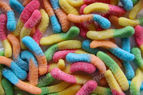 Preview: Colorful and Textured Sweet Sour Gummy Warms Background.