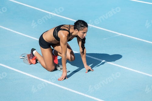 Preview: athlete woman in starting position