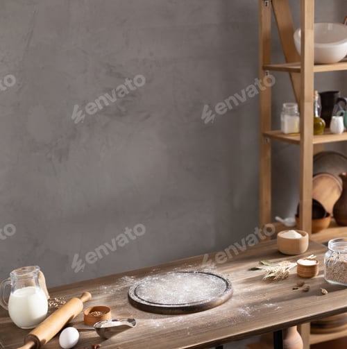 Preview: Wheat flour powder and pizza board for homemade bread cooking or baking on table. Food bread recipe