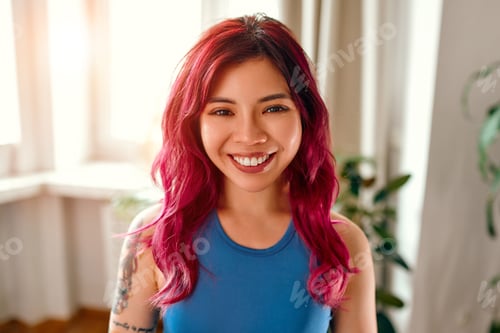 Preview: Asian young woman at home