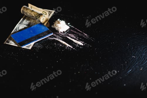 Preview: Hard drugs on black table. Close up.