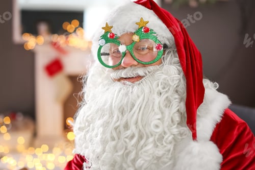Preview: Authentic Santa Claus with funny glasses indoors