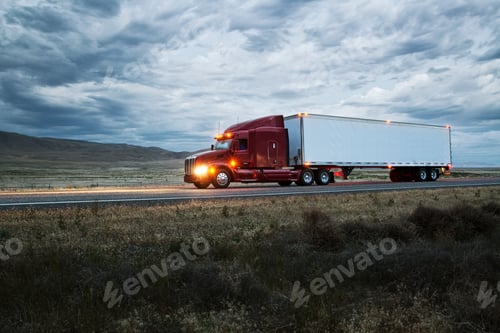 Preview: truck on a highway through the grasslands area of eastern Washington, USA.