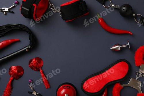 Preview: A collection of sex toys on a dark background.