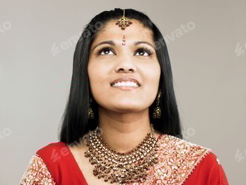 Preview: Young woman looking up