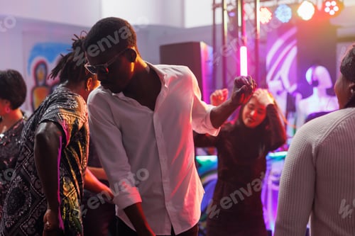 Preview: Clubber partying on crowded dancefloor