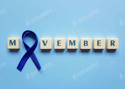 Preview: Blue background with tiles spelling out Movember and a blue ribbon