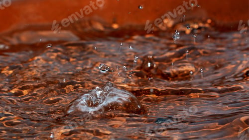 Preview: Raindrop Splashes - Close Up Photograph Of Raindrop Splashes In A Clay Bird Bath. Filter Added For