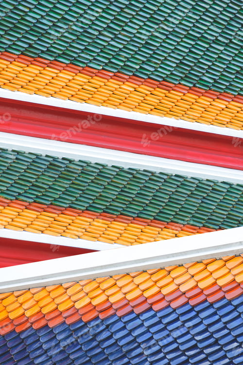 Preview: Colorful traditional imbrication ceramic tile roofs pattern of Thai temple in vertical frame