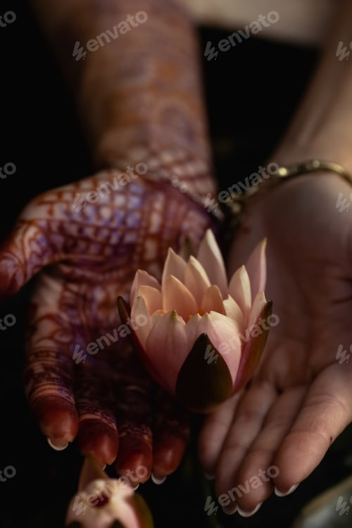 Preview: Mehndi adorns the women's hands with a beautiful flower design.Vesak day