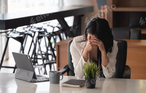 Preview: Businesswoman get stressed and headache while having a problem.