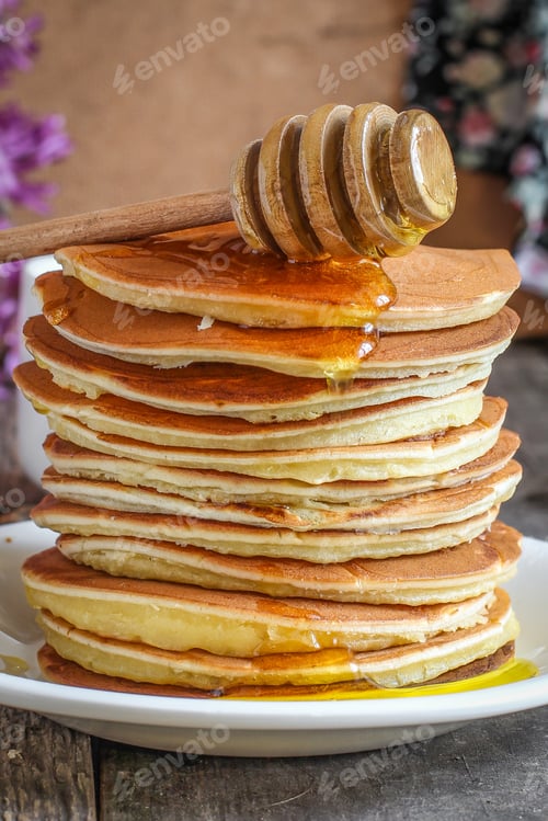 Preview: Pancakes In A Plate On A Wooden Surface