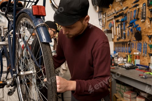 Preview: Technicians in bicycle workshop