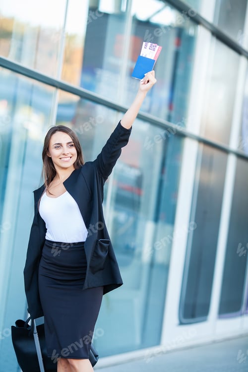 Preview: Young Cheerful Woman With a Suitcase. The Concept of Travel, Work, Lifestyle