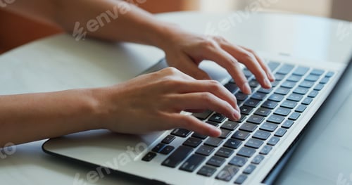 Preview: Woman type on laptop computer