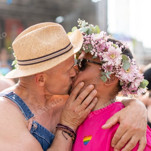 Preview: LGBT couple in vibrant share a kiss on the blurry background