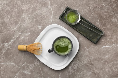 Preview: Flat lay composition with matcha tea on table