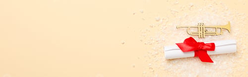 Preview: Golden musical instruments on a light background.