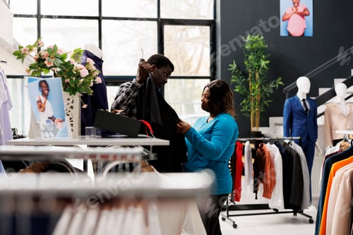 Preview: Shopper checking clothes fabric