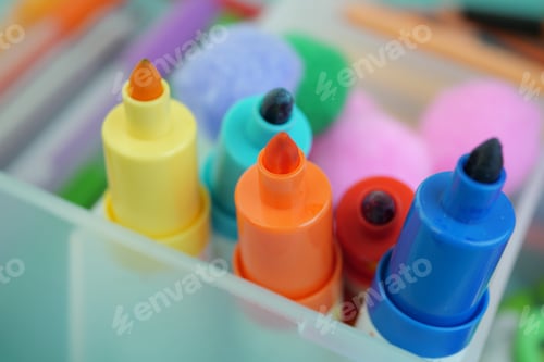 Preview: Bright markers in a crafting container for creative projects