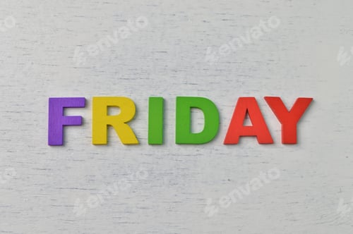 Preview: Colorful wooden alphabet with text FRIDAY. A happy Friday concept