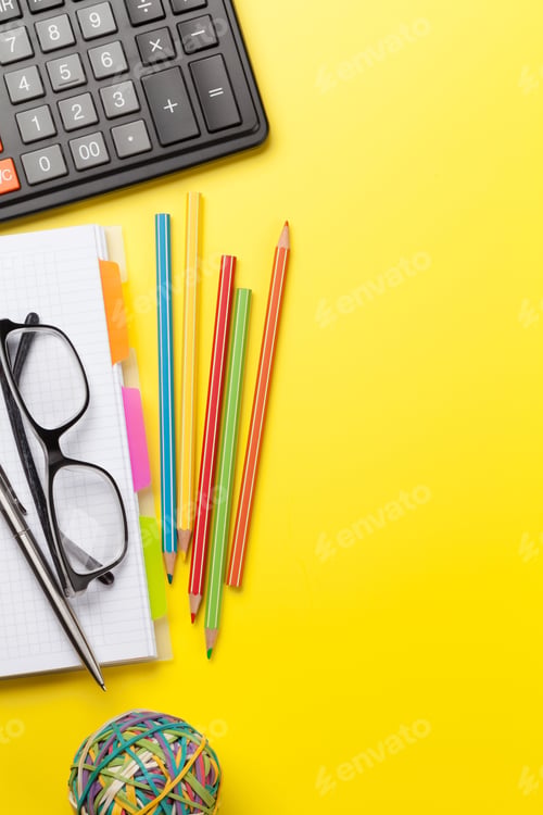 Preview: Office yellow backdrop with supplies and glasses