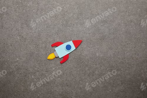 Preview: colorful handmade rocket on gray background