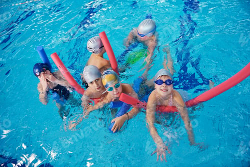 Preview: Happy Children Kids Group At Swimming Pool Class Learning To Swim