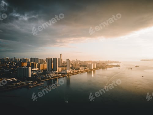 Preview: city skyline with sea view at sunrise. Karpal Singh Drive, Penang, Malaysia.