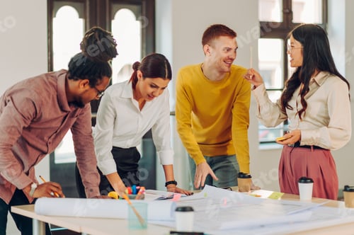Preview: Diverse group of engineers or architects having a meeting in an office