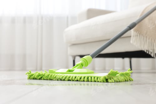 Preview: Microfiber mop on floor near sofa indoors