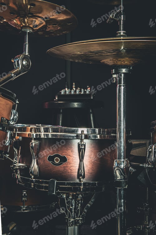 Preview: Close-up, part of a drum kit on a blurred background.