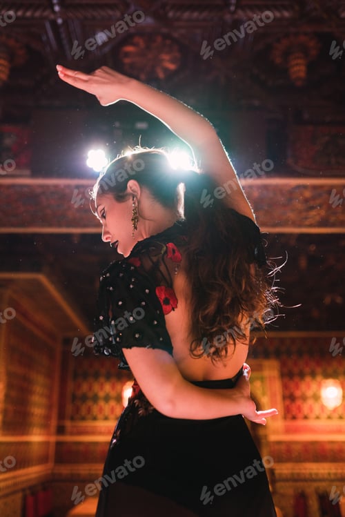 Preview: Woman in dress dancing flamenco on scene